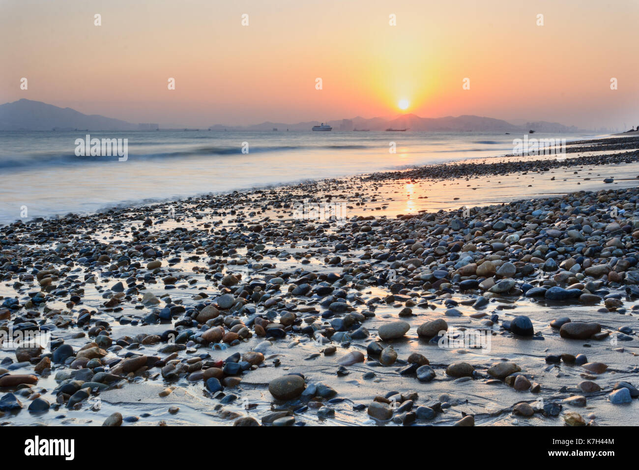 Xiamen Huandao Road Seascape Sunset in China Stock Photo