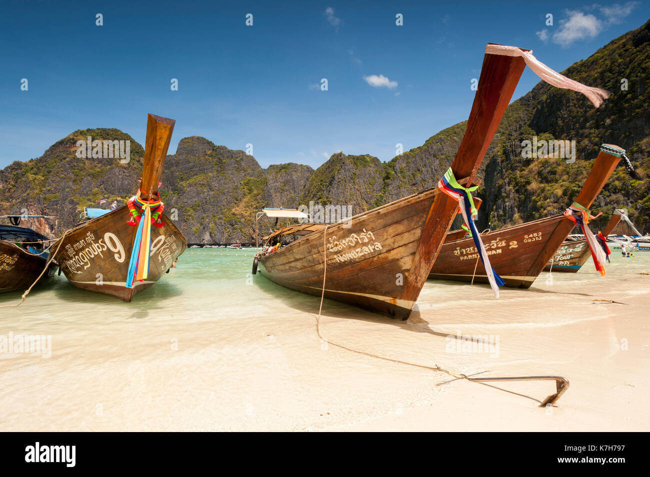 Long-tail boats in Maya Bay, Phi Phi Islands, Thailand. Stock Photo