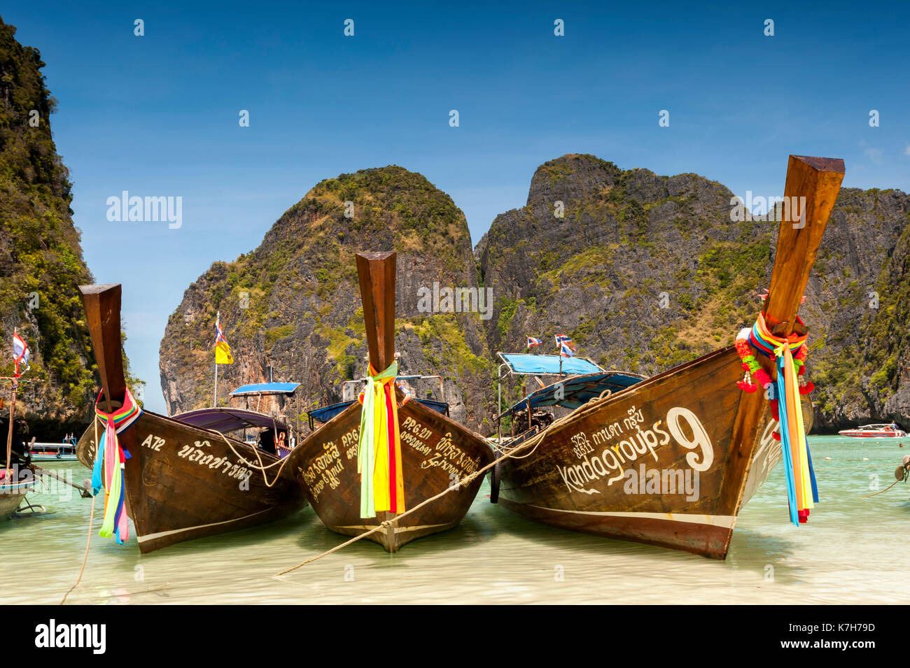 Long-tail boats in Maya Bay, Phi Phi Islands, Thailand. Stock Photo
