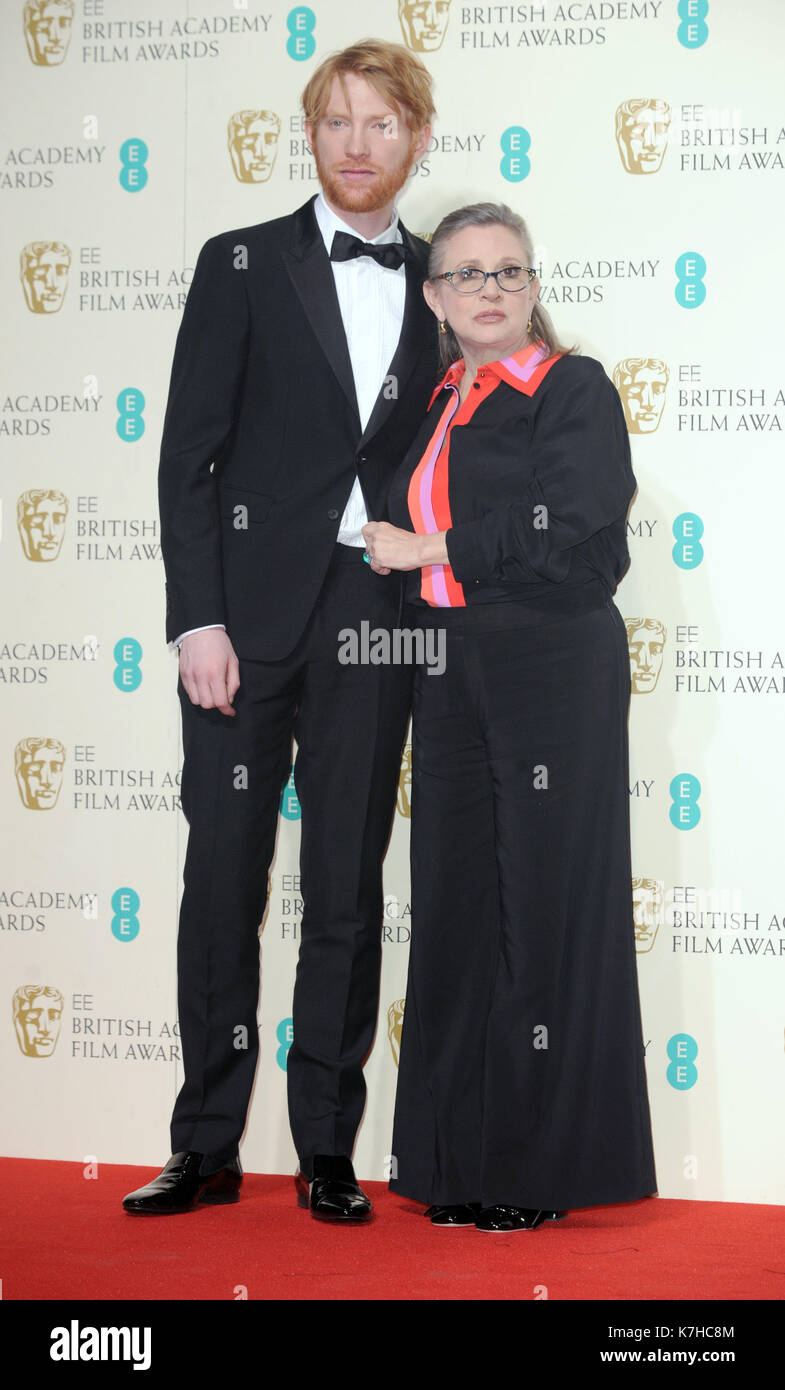 Photo Must Be Credited ©Kate Green/Alpha Press 079965 14/02/2016 Domhnall Gleeson and Carrie Fisher at the EE Bafta British Academy Film Awards Pressroom at at the Royal Opera House in London. Stock Photo
