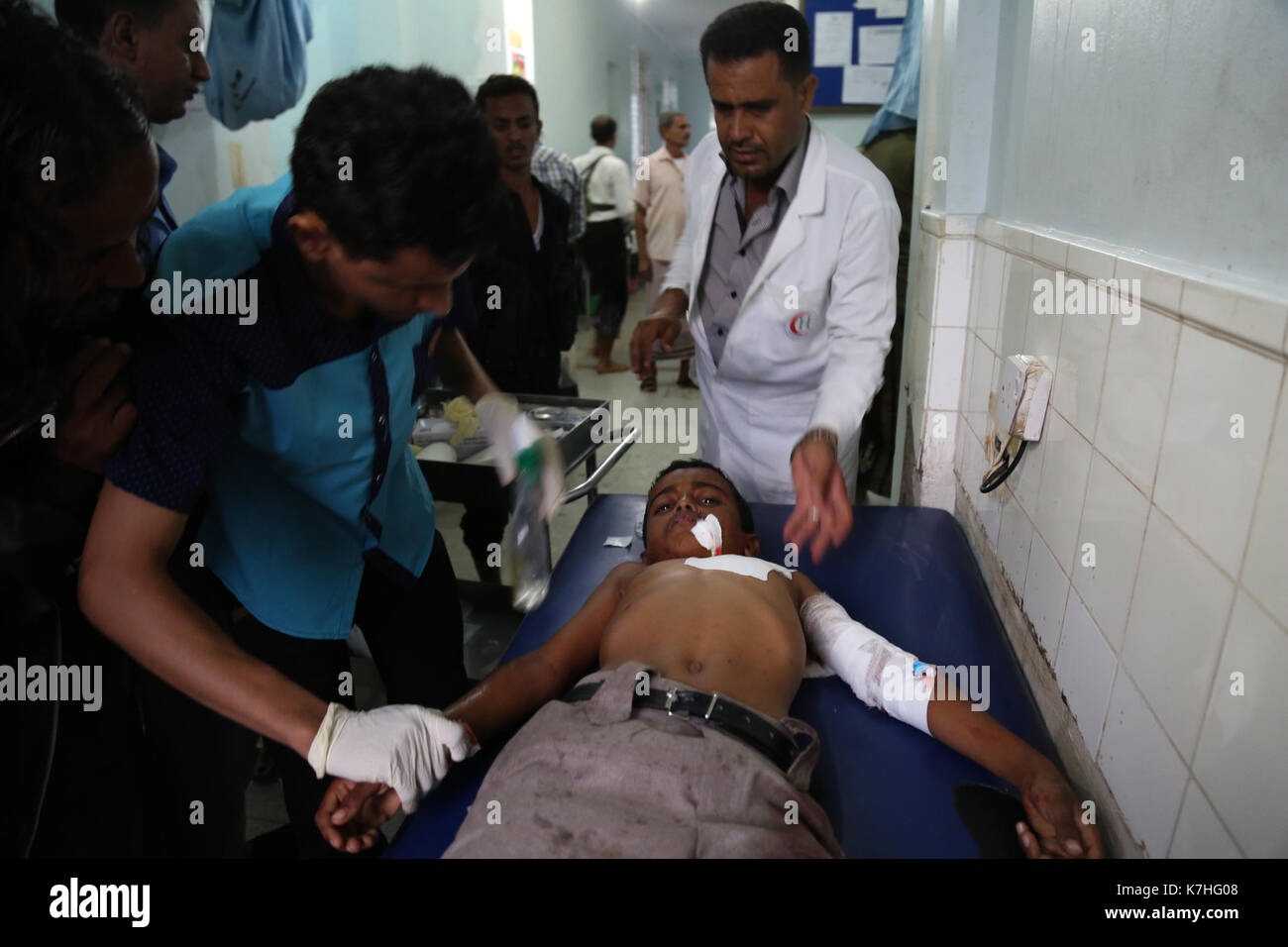 Civilians are treated in the Revolution hospital in the centre of Taiz for various injuries, following artillery shelling in residential neighbourhoods of the Yemeni city. 15th Sep, 2017. The bombardment was carried out by the Ansar Allah movement (Houthi) and their allied forces loyal to former Yemeni president Ali Abdullah Salih. Three missiles targeted the neighbourhoods of Shab Dima, of the Al-Sameel market, and of Jiula Al-Haud, located in the west of Taiz, killing three children and injuring ten civilians Credit: Abdulnaser Alseddik/ImagesLive/ZUMA Wire/Alamy Live News Stock Photo