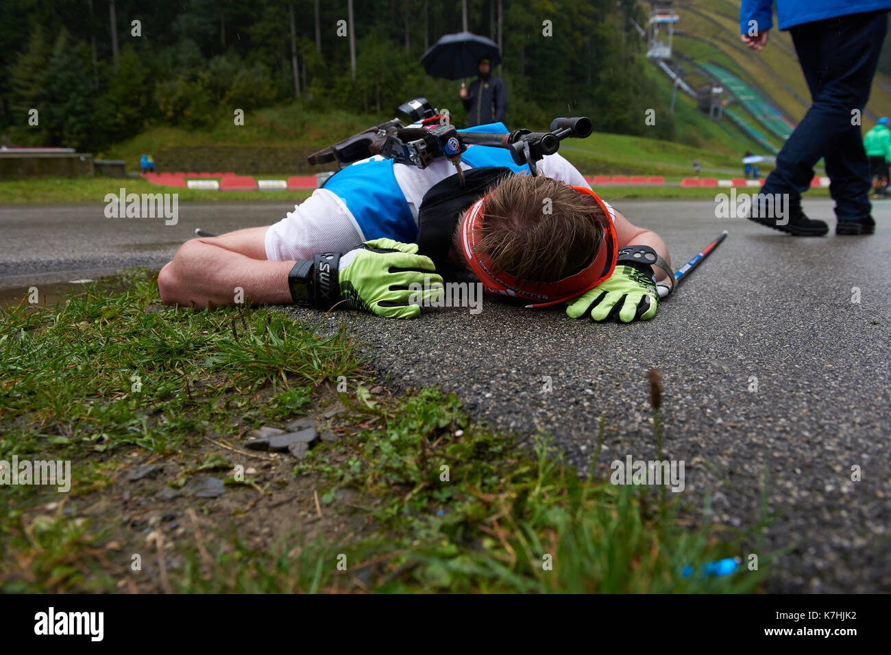 Total exhaustion after the Mass start Biathlon, German Summer Championships, Massenstartwettkampf Männer 15 km, DEUTSCHE  BIATHLON MEISTERSCHAFT 2017 Stock Photo