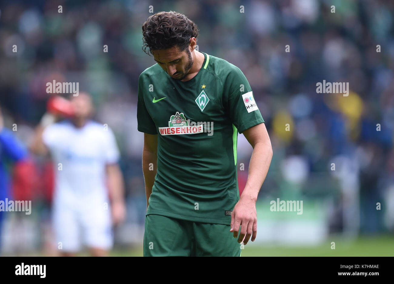 Bremen, Germany. 16th Sep, 2017. Bremen's Ishak Belfodil leaves the pitch for the half-time break during the German Bundesliga soccer match between Werder Bremen and FC Schalke 04 in the Weserstadion in Bremen, Germany, 16 September 2017. (EMBARGO CONDITIONS - ATTENTION: Due to the accreditation guidelines, the DFL only permits the publication and utilisation of up to 15 pictures per match on the internet and in online media during the match.) Photo: Carmen Jaspersen/dpa/Alamy Live News Stock Photo
