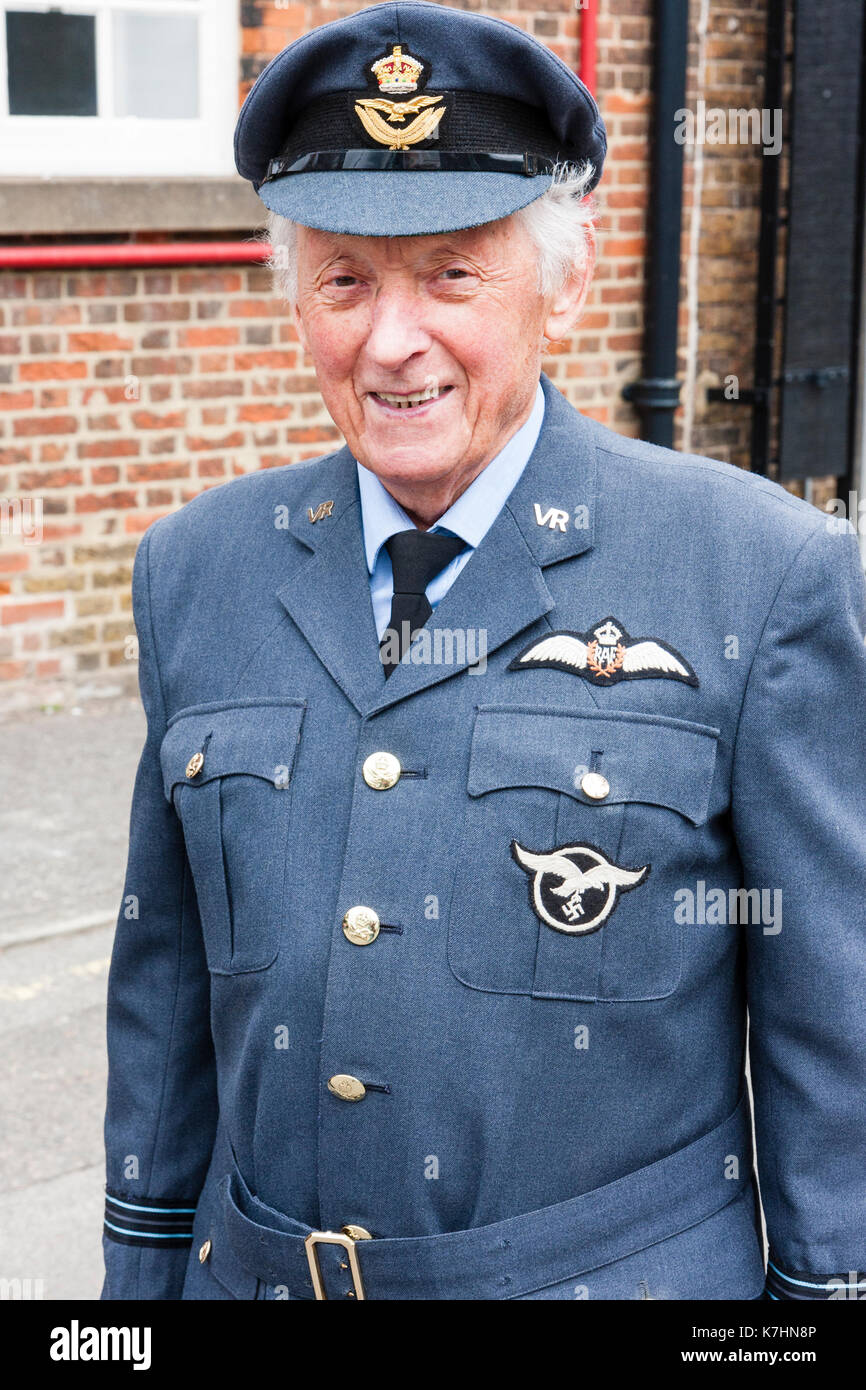 England, Chatham Dockyard. Event, Salute to the forties. Elderly man in RAF officer's uniform with Luftwaffe insignia on as well as RAF insignia. Close up, posed, smiling, eye-contact. Stock Photo
