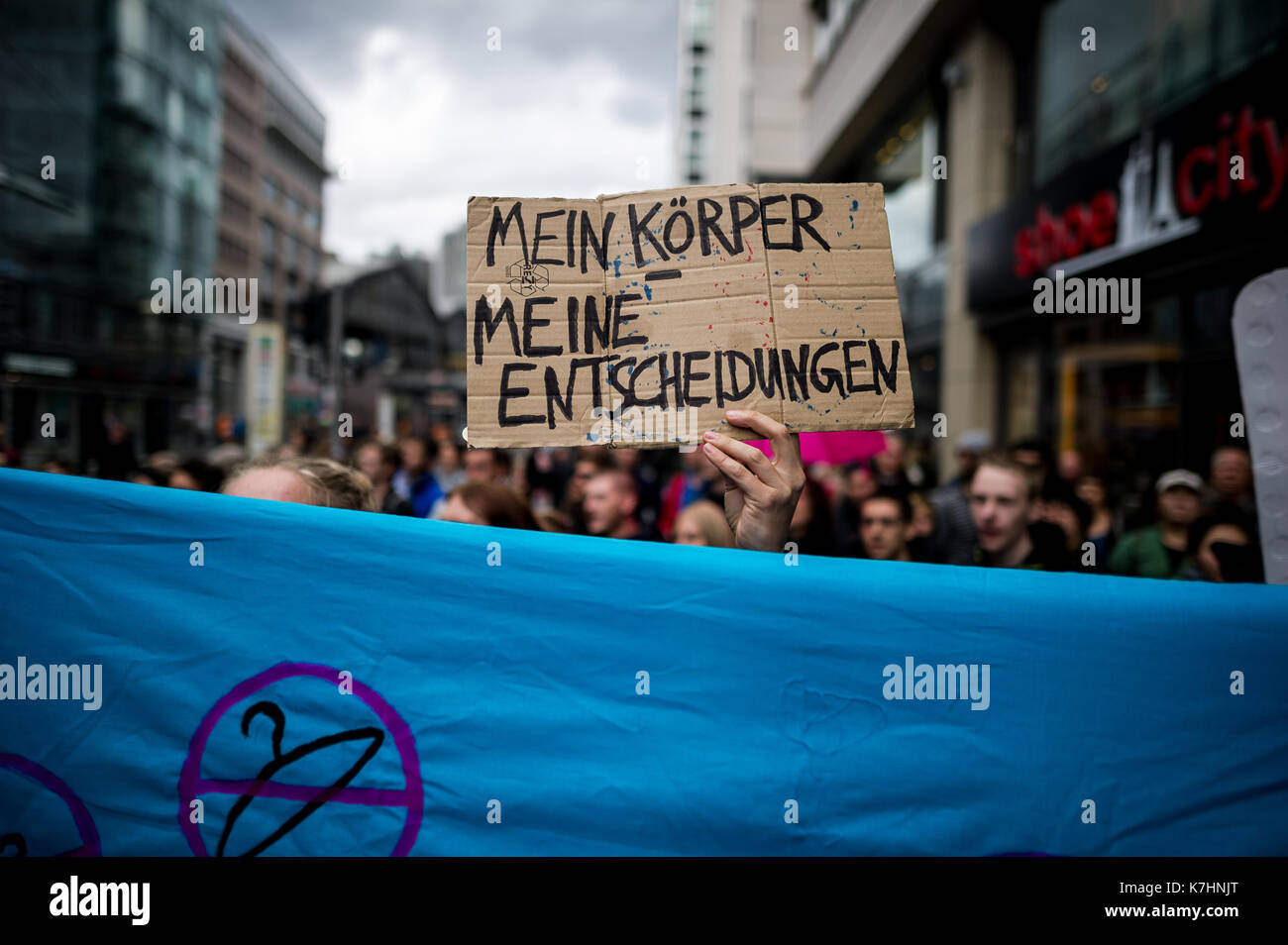 Counter-demonstrator stand behind a barricade. Under the motto 'Protect the most vulnerable, yes to every child', anti-abortionist and so-called 'lifeguards' move through Berlin. Critics accuse participants of religious fundamentalism. Stock Photo