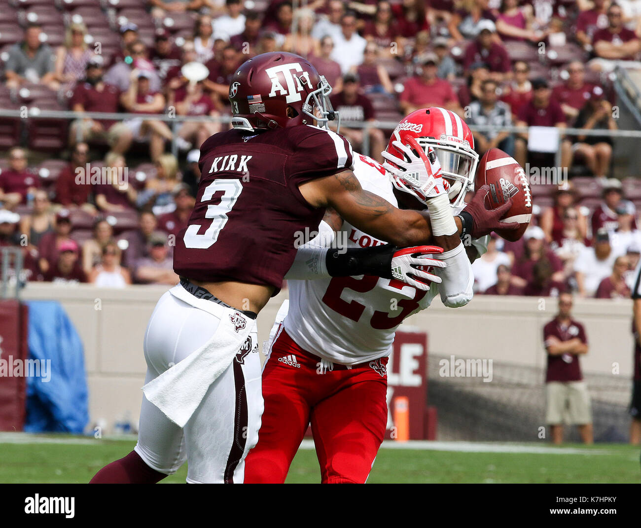 September 16, 2017: Louisiana-Lafayette Ragin Cajuns defensive back Tracy Walker (23) breaks up a pass intended for Texas A&M Aggies wide receiver Christian Kirk (3) in the first quarter during the NCAA football game between the Louisiana-Lafayette Ragin Cajuns and the Texas A&M Aggies at Kyle Field in College Station, TX; John Glaser/CSM. Stock Photo