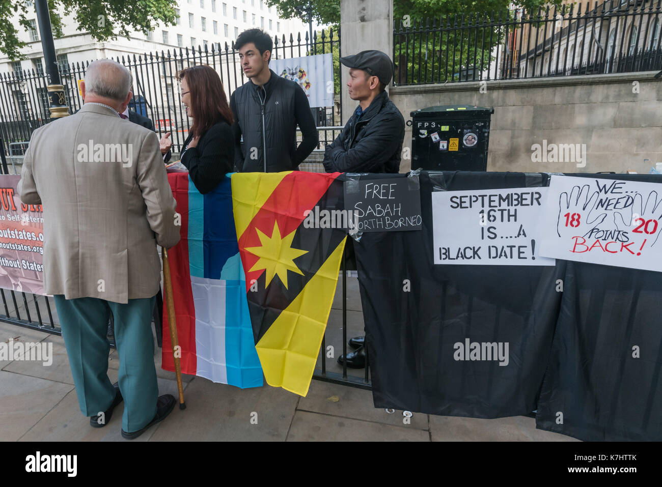 London, UK. 16th September 2017. Sabahans and Sarawkians protest at Downing St on  Malaysia Day, which they say is a 'Black Day for Sabah and Sarawak', calling for a restoration of human rights and the repeal of the Sedition Act and and freedom for Sarawak and Sabah. On 16th September 1963 the two independent countries in North Borneo joined with the Federation of Malaya and Singapore to form Malaysia, with promises, assurances and undertakings for their future in the federation, including the '20 points' of an Inter-Governmental Committee (IGC) Report, which they say have been cast aside, wit Stock Photo