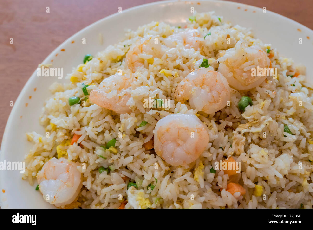 Delicious taiwanese style shrimp fry rice, serve with green beans, eggs