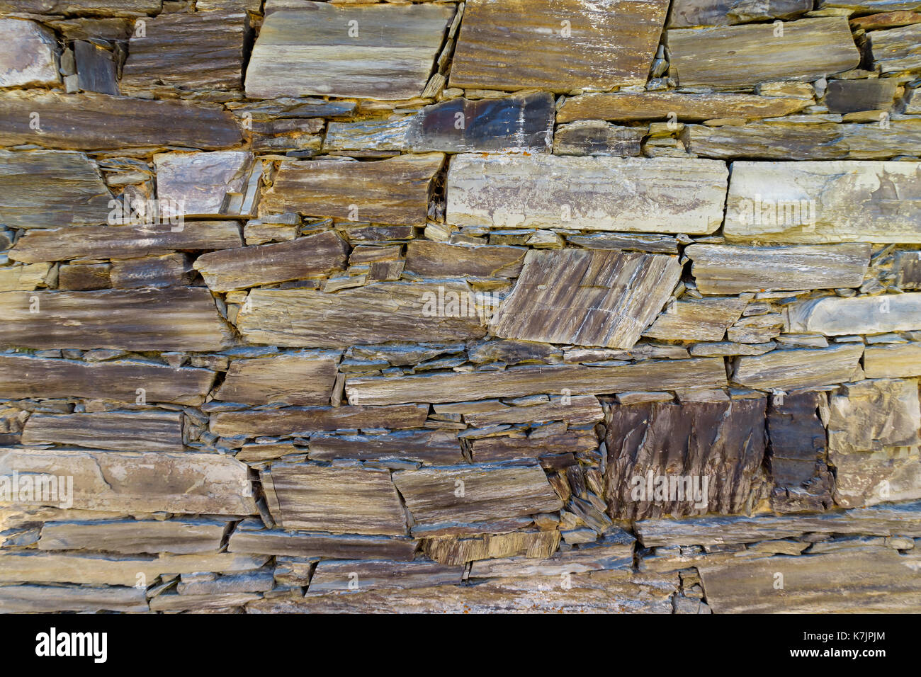 Background of old rustic slate wall. Stock Photo