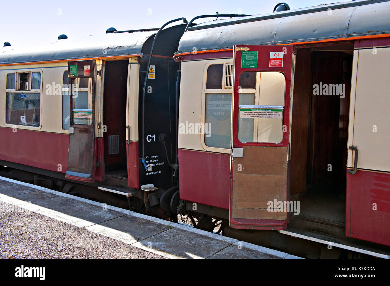 Opening doors on vintage Mark One railway carriage Stock Photo