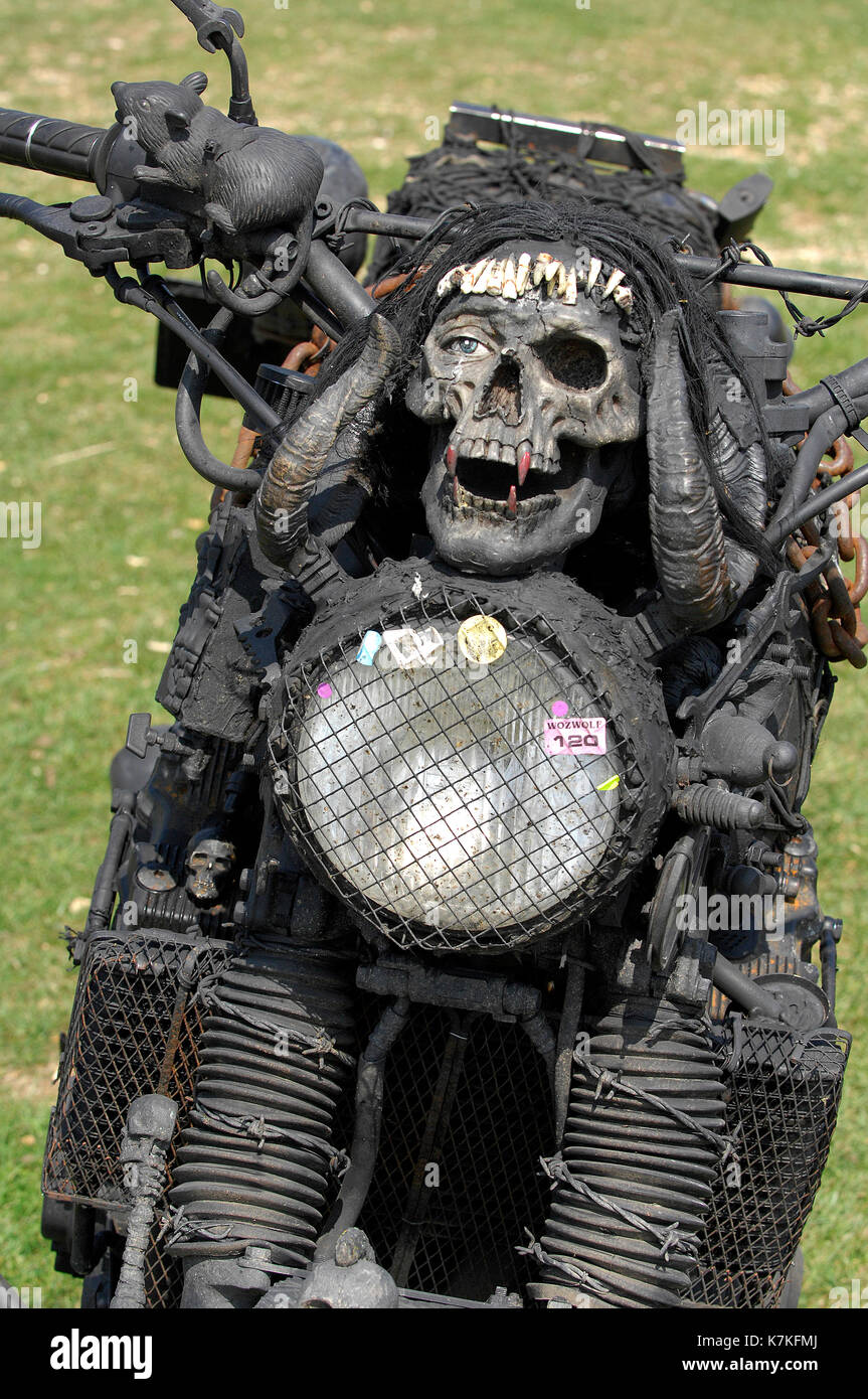 a rat bike or motorcycle designed to be scary or frightening with a skull above the healight and mostly painted black ridden by hells angels and biker Stock Photo