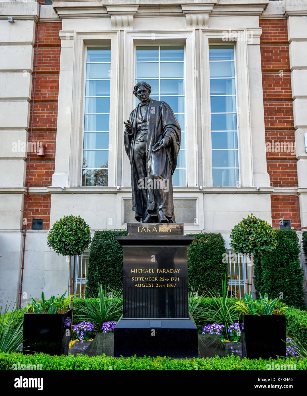 A statue of English chemist and physicist Michael Faraday in front of Royal Institution in London, England Stock Photo