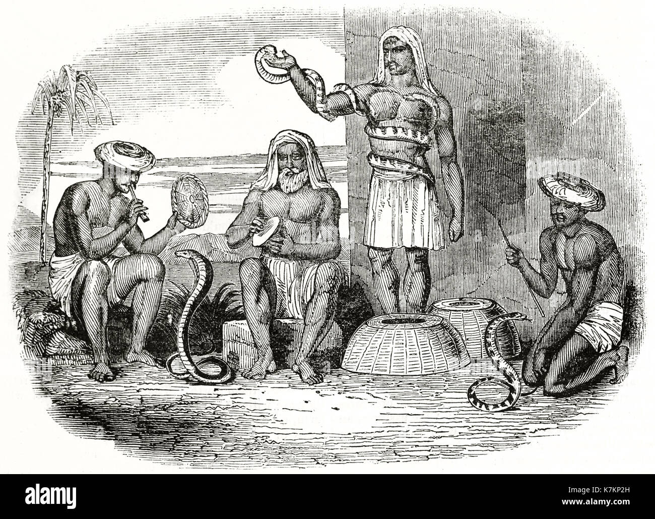 Old illustration of snake charmers in India. By unidentified author, publ. on The Penny Magazine, London, 1837 Stock Photo