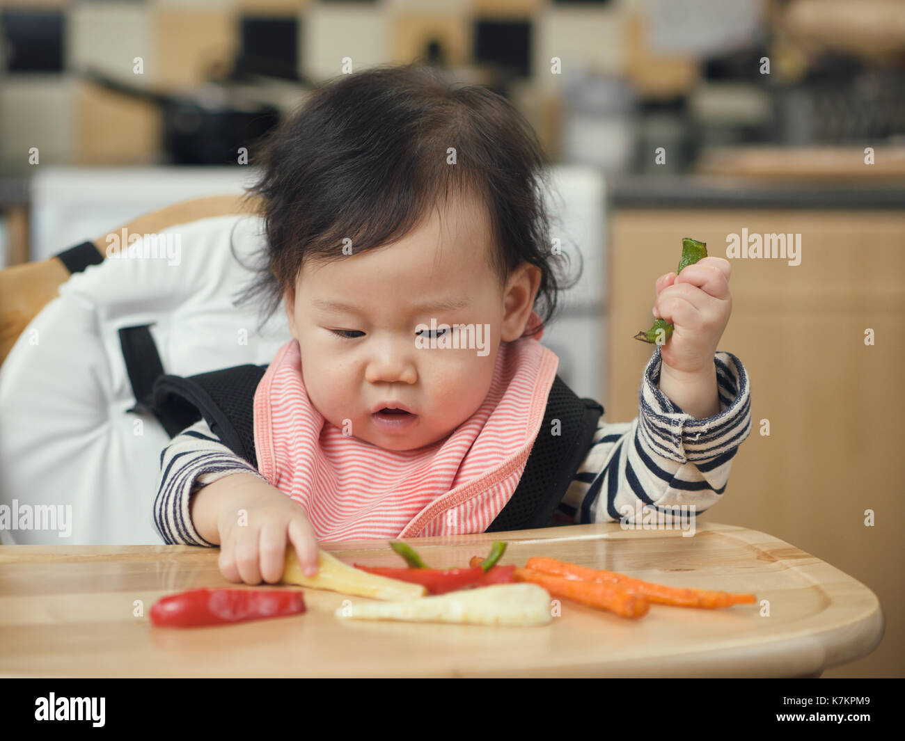 Baby Food Pureed Parsnip On A Spoon Stock Photo - Download Image