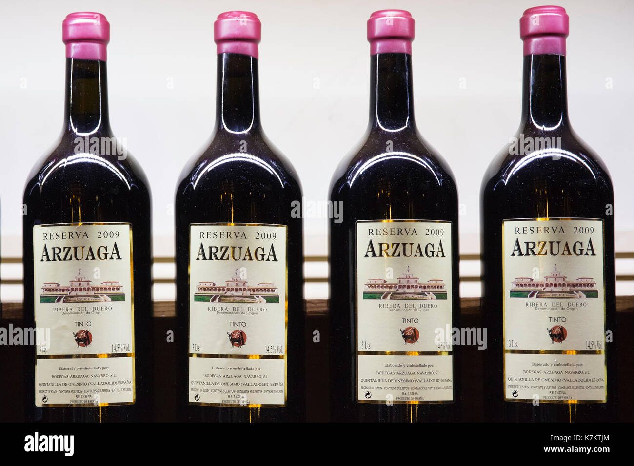 Bottles of red wine of Bodegas Arzuaga Reserva 2009, ribera del Duero wine production by River Duero, Navarro, Spain Stock Photo