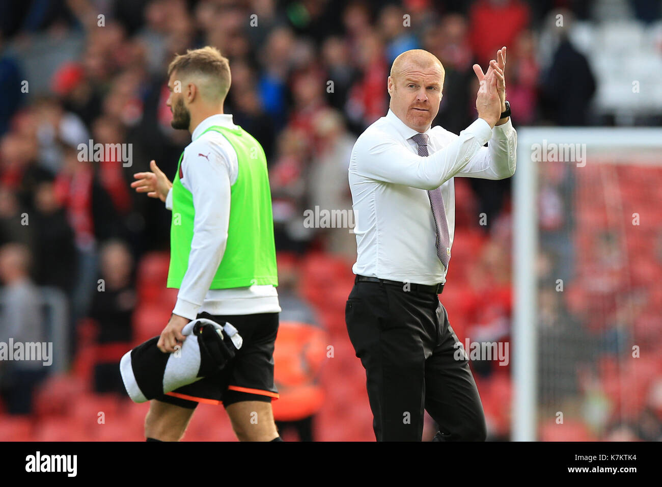 Burnley manager Sean Dyche applauds supporters after the final whistle ...