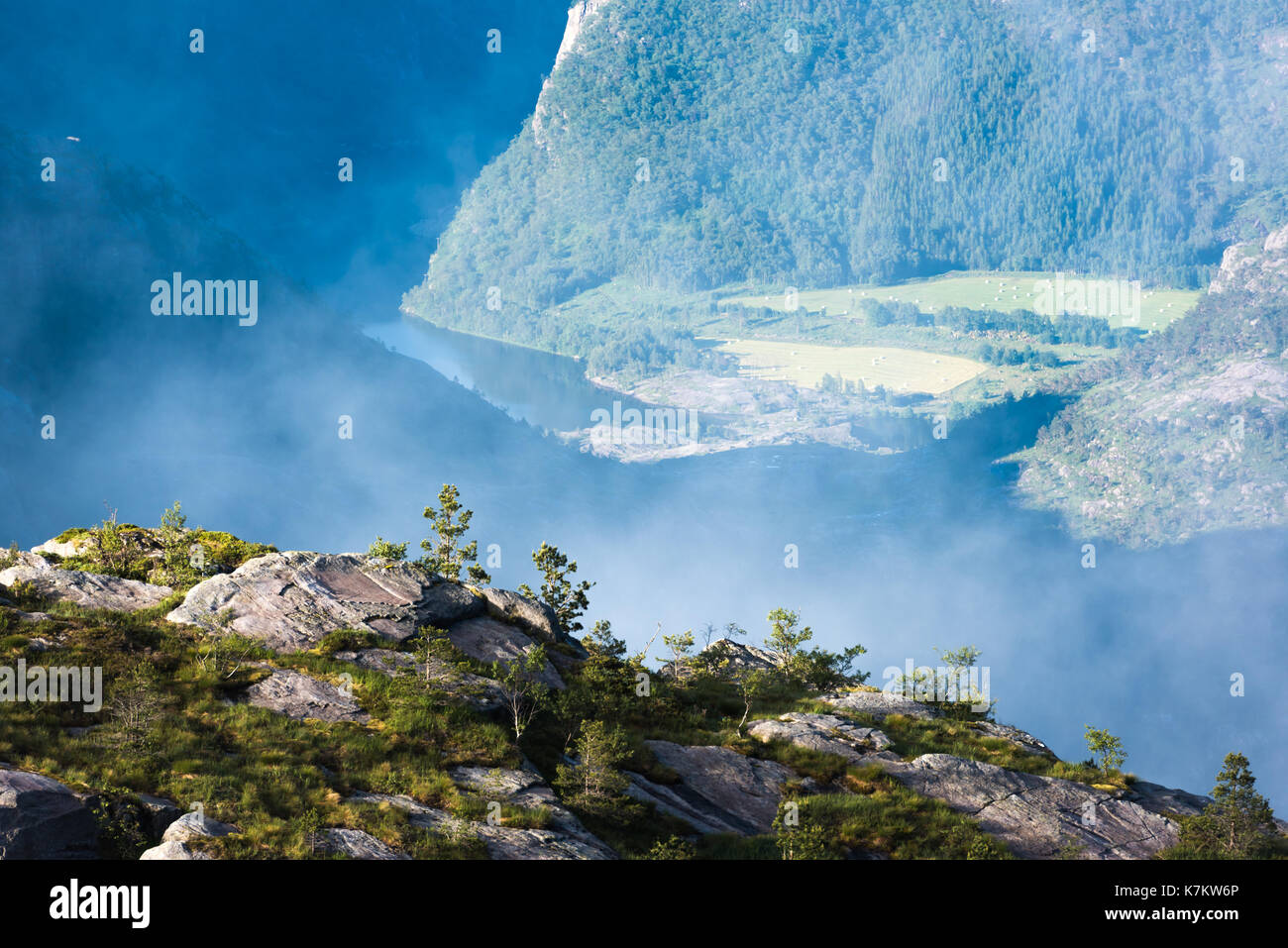 Misty morning on Preikestolen (pulpit-rock) - famous tourist attraction in the municipality of Forsand in Rogaland county, Norway Stock Photo
