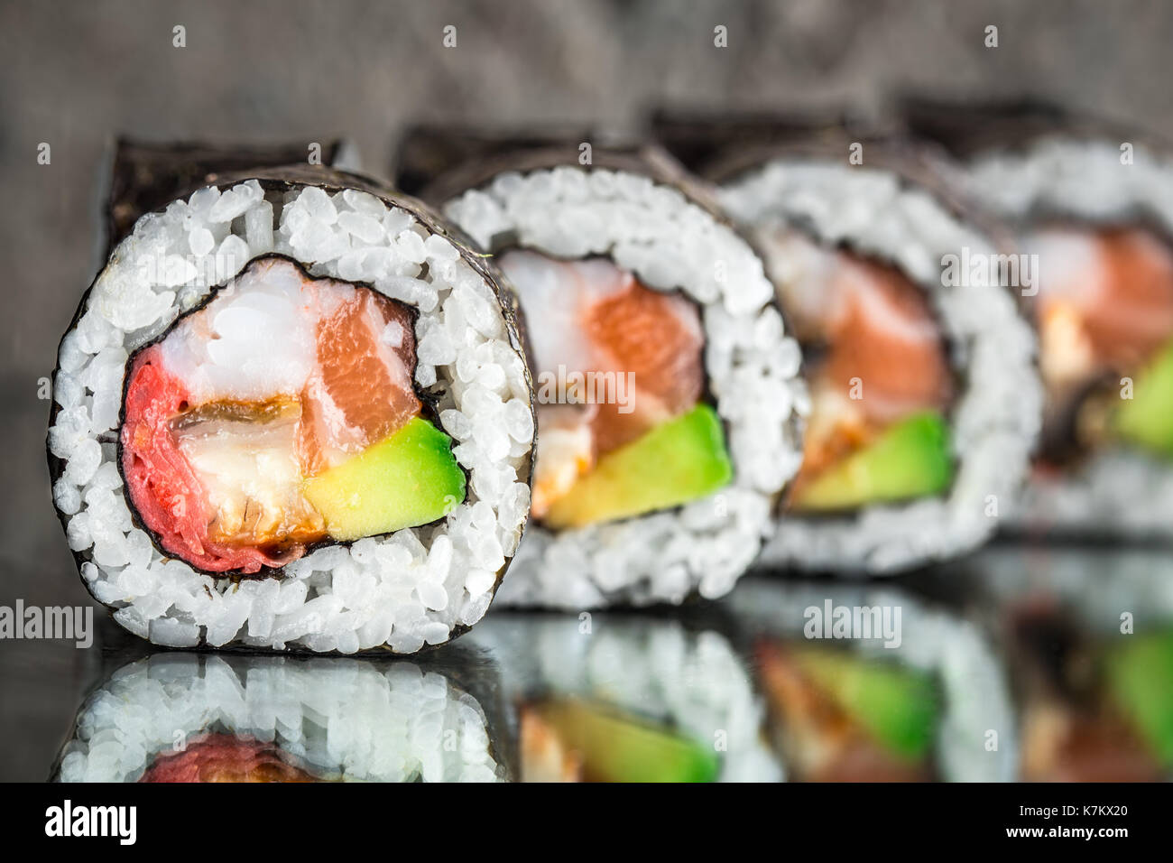 https://c8.alamy.com/comp/K7KX20/sushi-roll-with-salmon-shrimps-and-avocado-K7KX20.jpg