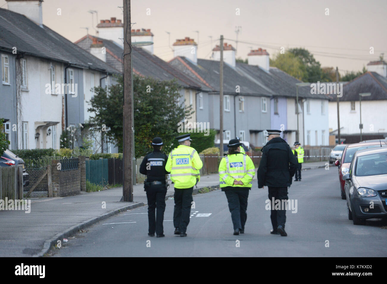 Police officers taking part in an operation in Cavendish Road, Sunbury-on-Thames, Surrey, as part of the investigation into the Parsons Green bombing. Stock Photo