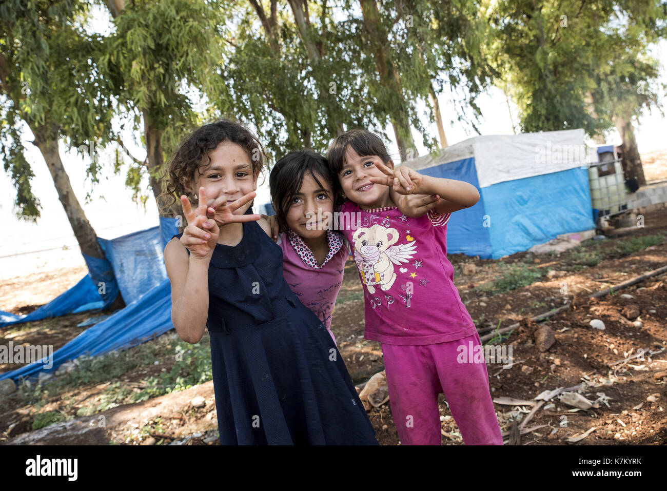 September 6, 2017, Akcakale, Turkey. Syrian people in unofficial refugee camp in Akcakale. These people are refugees from Idlib, Rakka and Aleppo and  Stock Photo