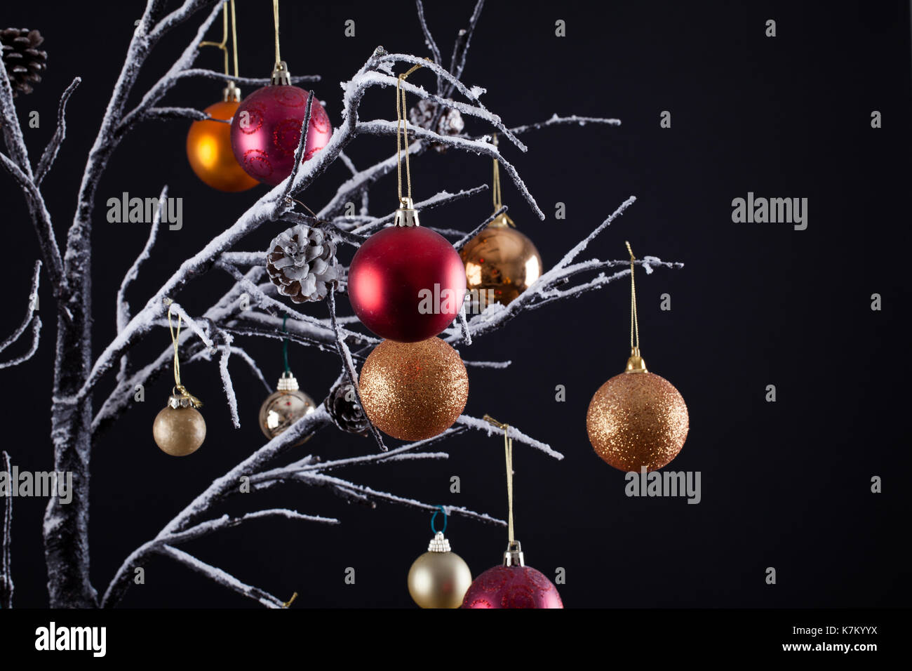 Modern Christmas Tree With Bare Snow Covered Branches Decorated