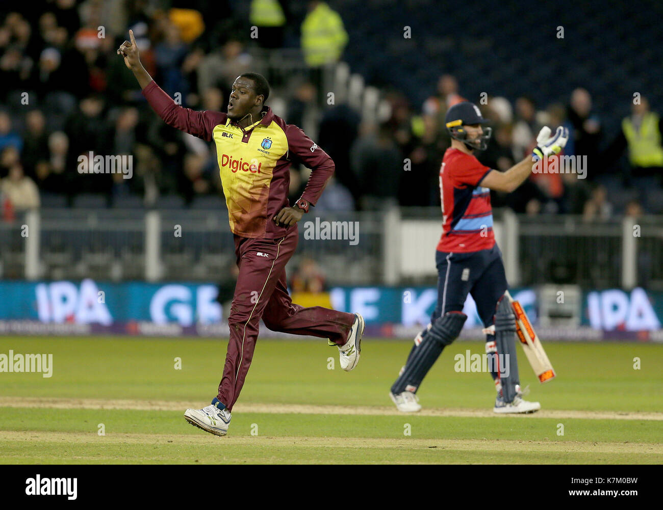 West Indies Carlos Brathwaite celebrates after taking the wicket of England's Liam Plunkett to win the NatWest T20 match at the Emirates Riverside, Durham. Stock Photo