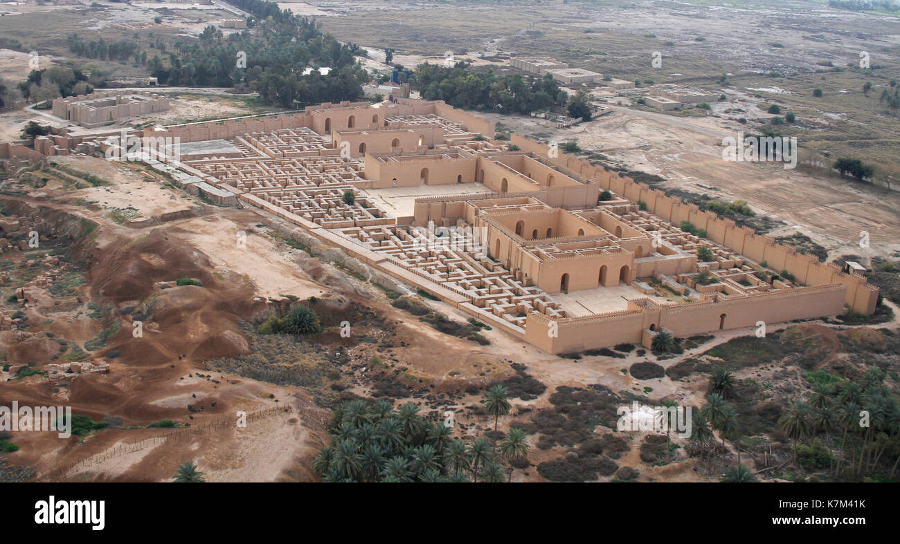 Ruins of the South palace of ancient Babylon, Iraq on the right. Ruins of the North palace damaged by US occupation on the left. Stock Photo