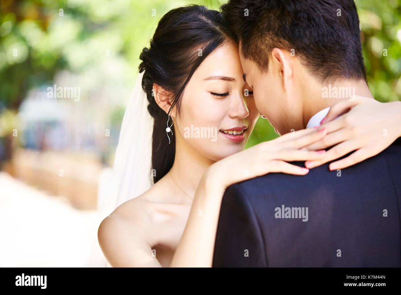 close-up portrait of intimate wedding couple. Stock Photo