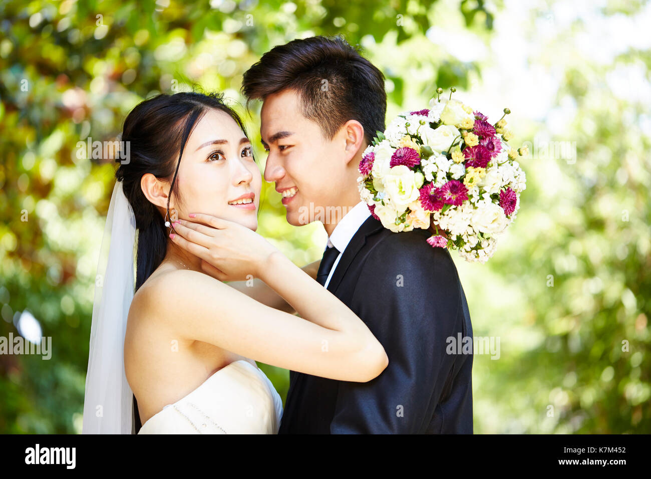 close-up portrait of loving wedding couple. Stock Photo