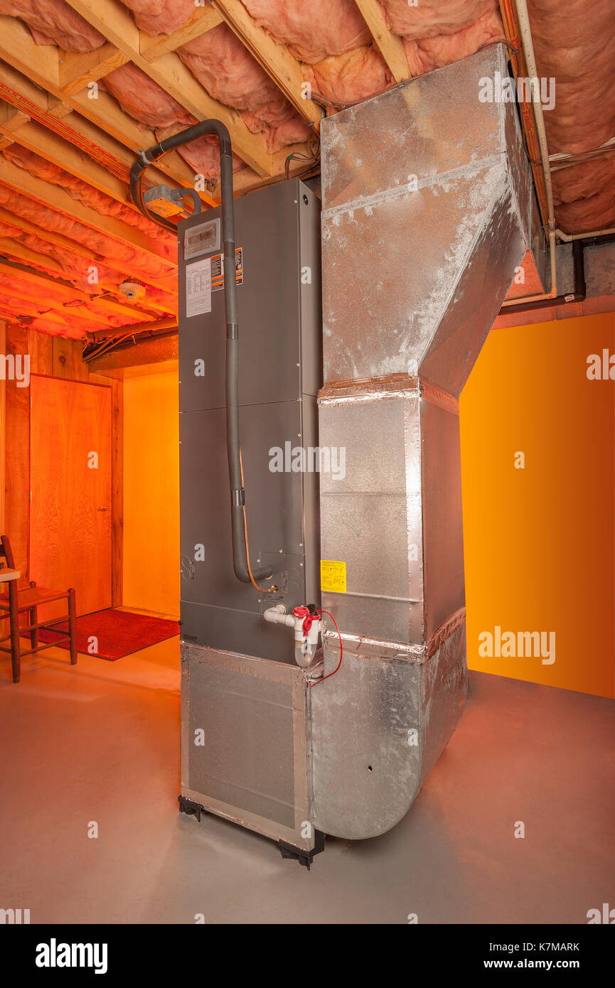 House forced hot air and air conditioning system in basement Stock