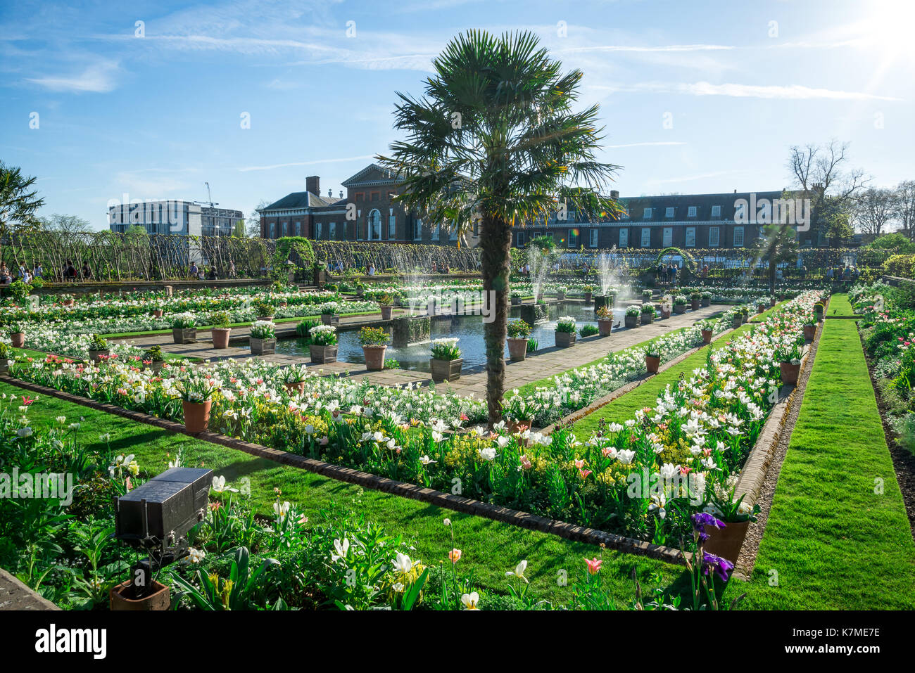 Kensington Palace Garden with fountains and blossoming flowers in spring time, London, Great Britain Stock Photo