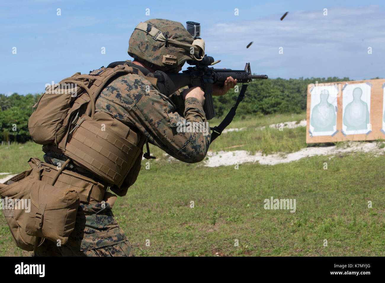 31st Marine Expeditionary Unit, fires an M16A4 service rifle Stock Photo