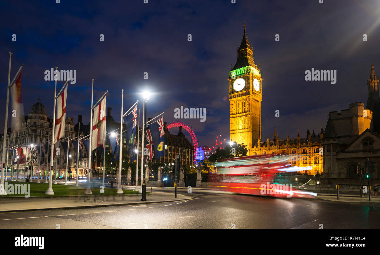 Red double-decker bus in front of Big Ben, Houses of Parliament, light tracks, night scene, City of Westminster, London Stock Photo