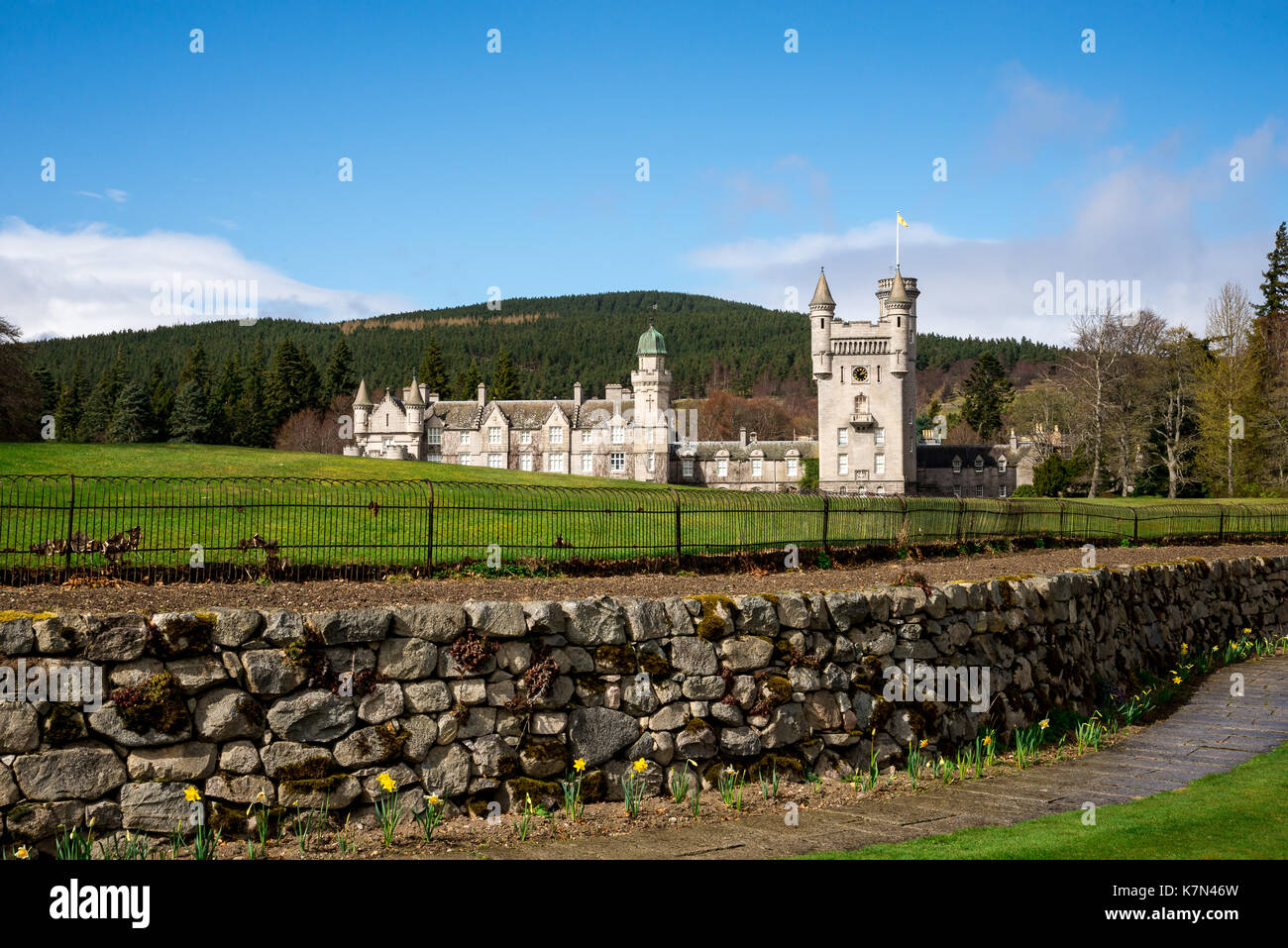 A view of Balmoral Castle in a distance from outside gardens, Scotland