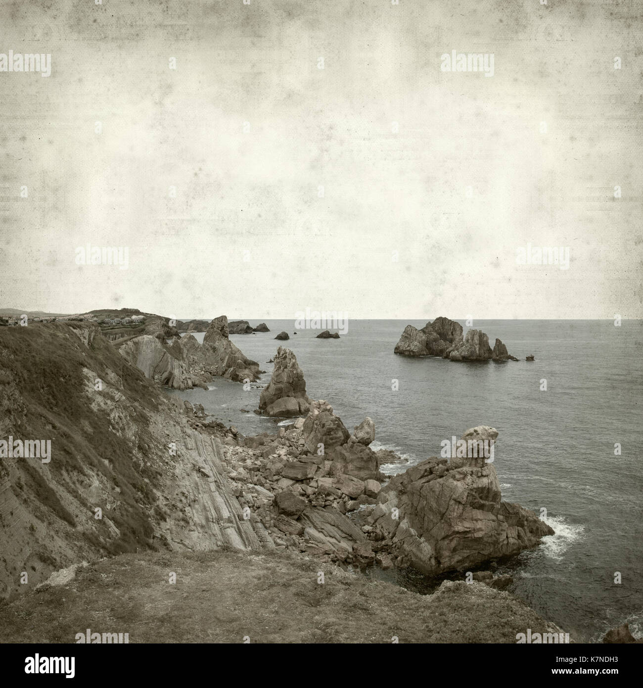 textured old paper background with Costa Quebrada, Cantabria Stock