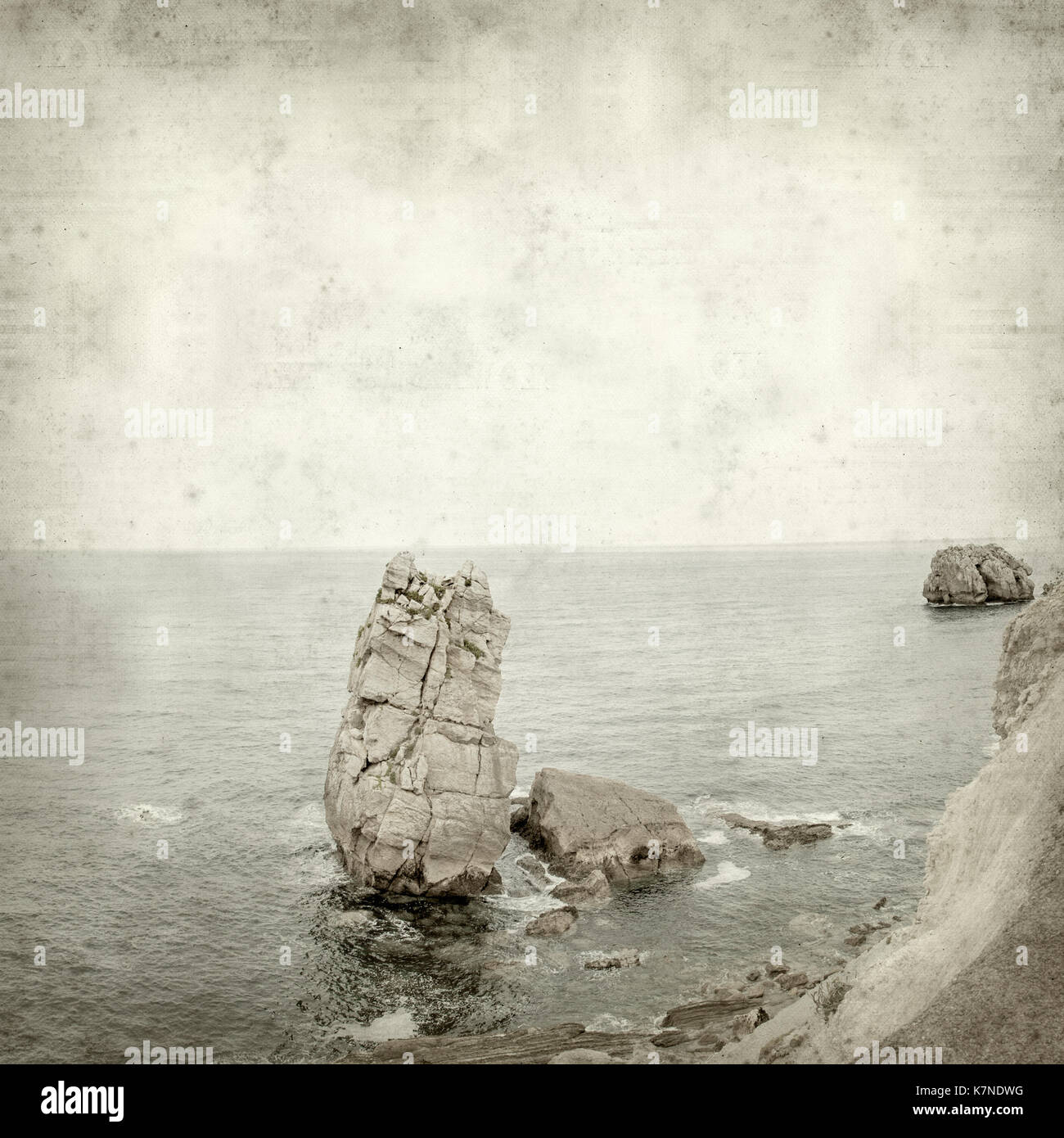 textured old paper background with Costa Quebrada, Cantabria Stock