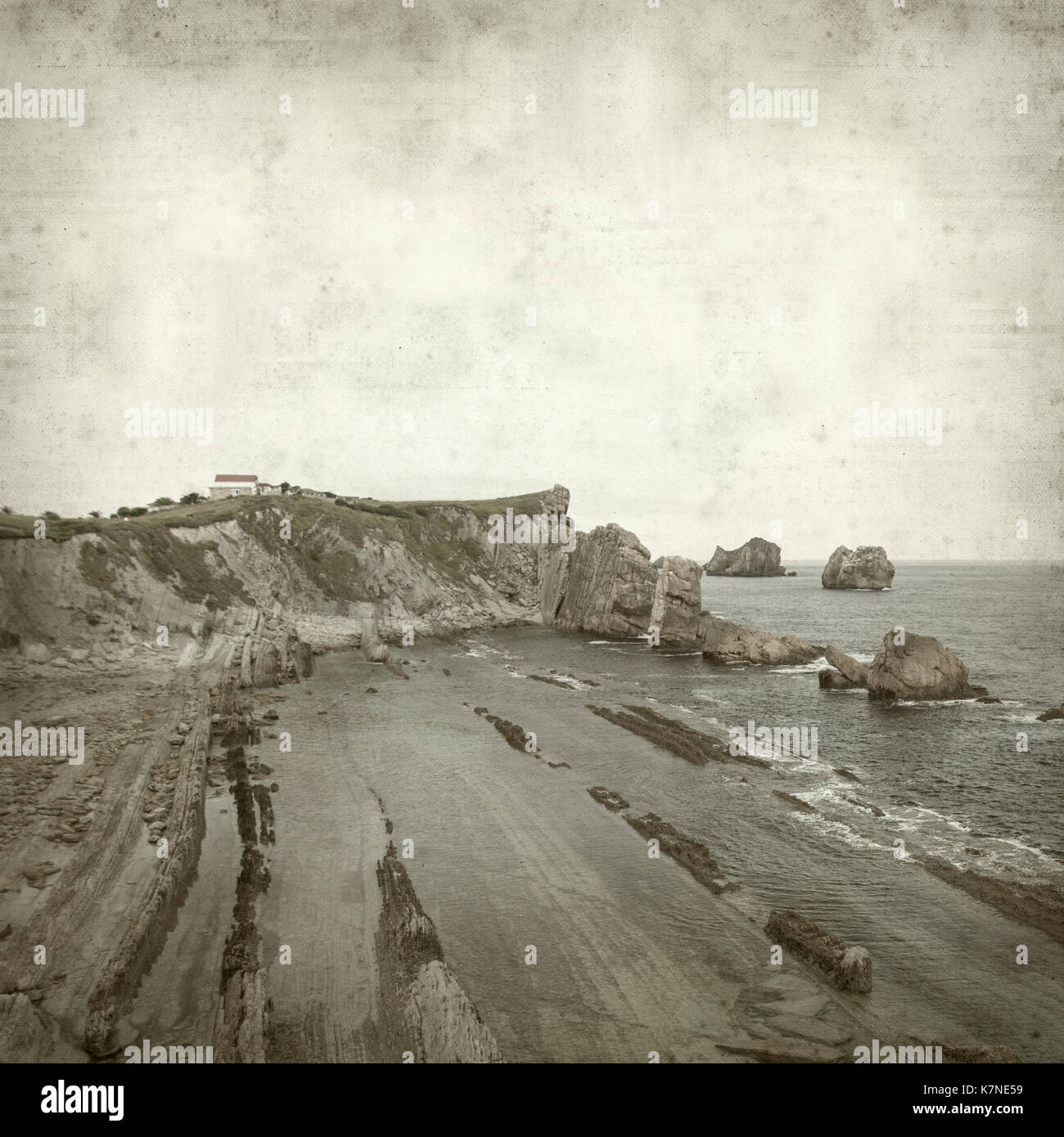 textured old paper background with Costa Quebrada, Cantabria Stock