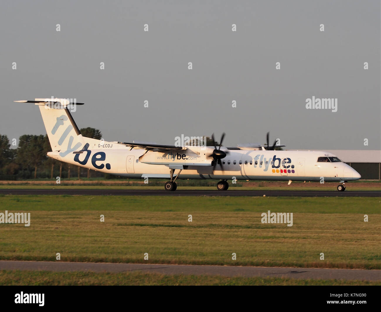 G-ECOJ, a Flybe De Havilland Canada DHC-8-402Q Dash 8, is shown landing ...