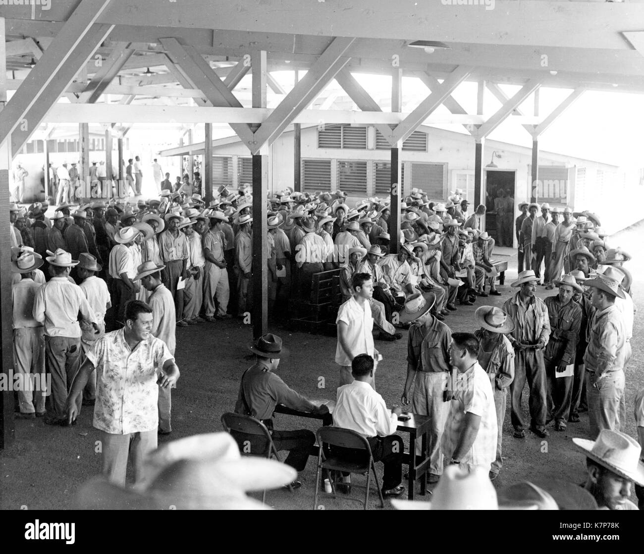 Braceros seeking temporary farm work in the United States gathered at labor centers along the border for processing, 01/01/1957. Stock Photo