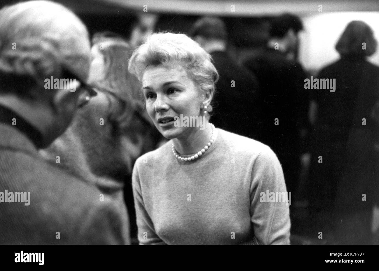 Actress Eva Gabor discusses one of the days' projects at The Actor's Studio with Lee Strasberg (back to the camera), Director of the Studio, New York, NY, 1957. Stock Photo