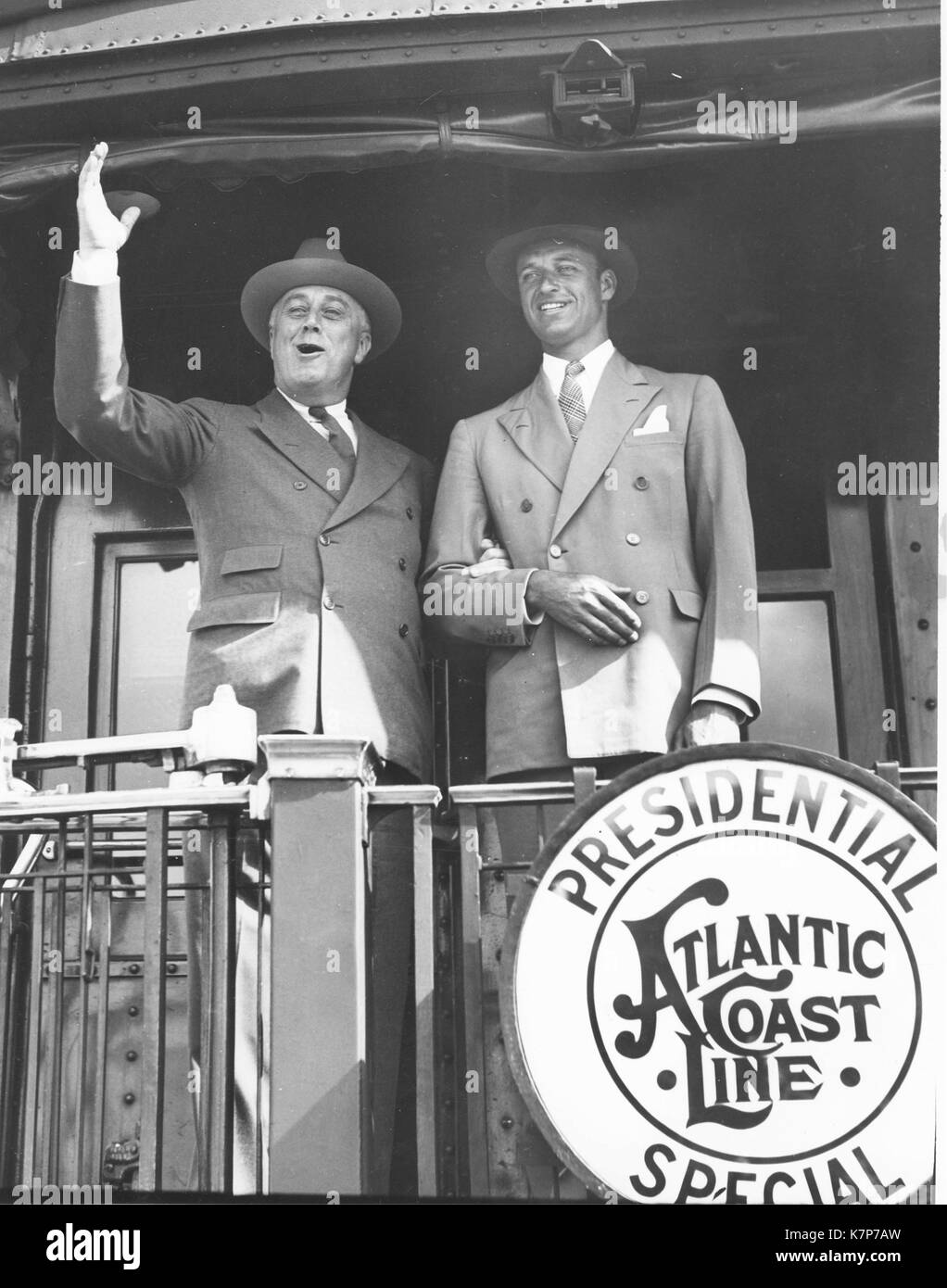 President Franklin D Roosevelt with son James Roosevelt aboard rear of the Presidential Special of the Atlantic Coast Line campaign train, 1934. Stock Photo