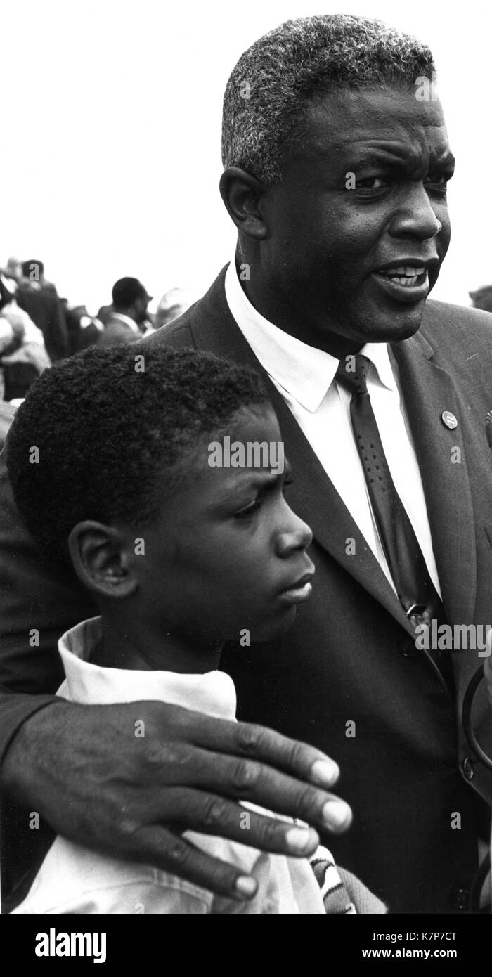 Former baseball star Jackie Robinson and his son David at the March on Washington in support of civil rights legislation, Washington, DC, 08/28/1963. Stock Photo