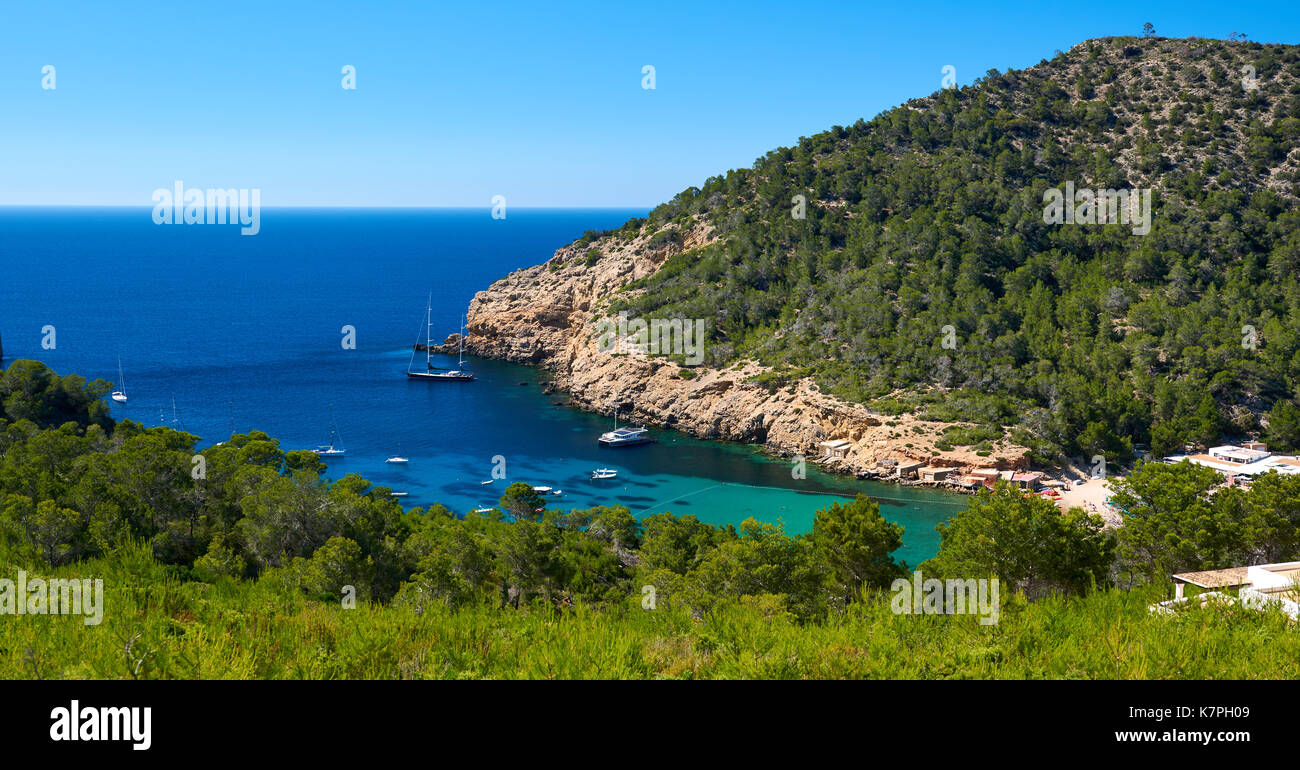 Rocky coastline of Benirras in Ibiza Island. Balearic Islands. Spain Stock Photo