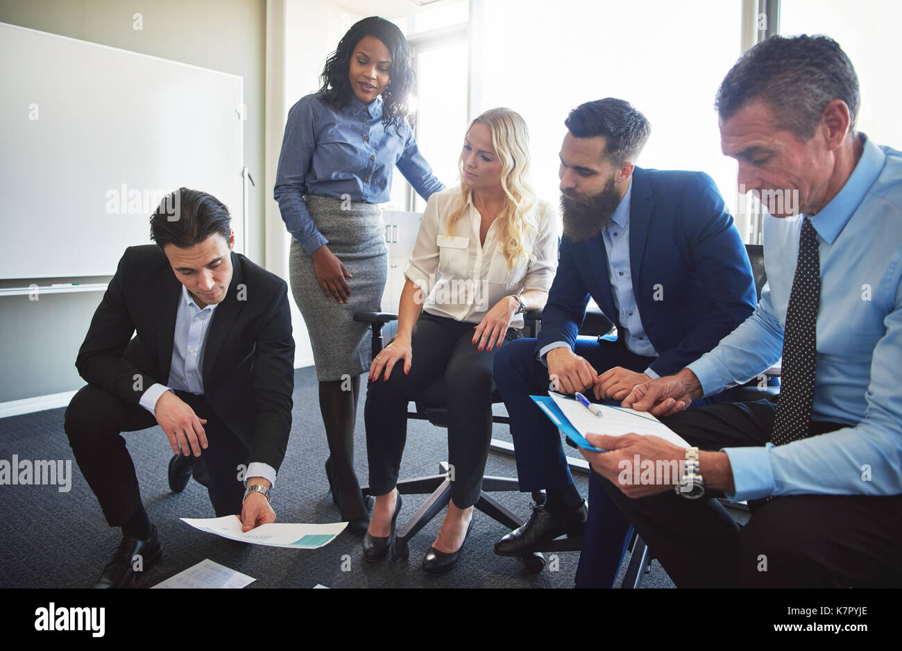Focused professionals work together hi-res stock photography and images ...