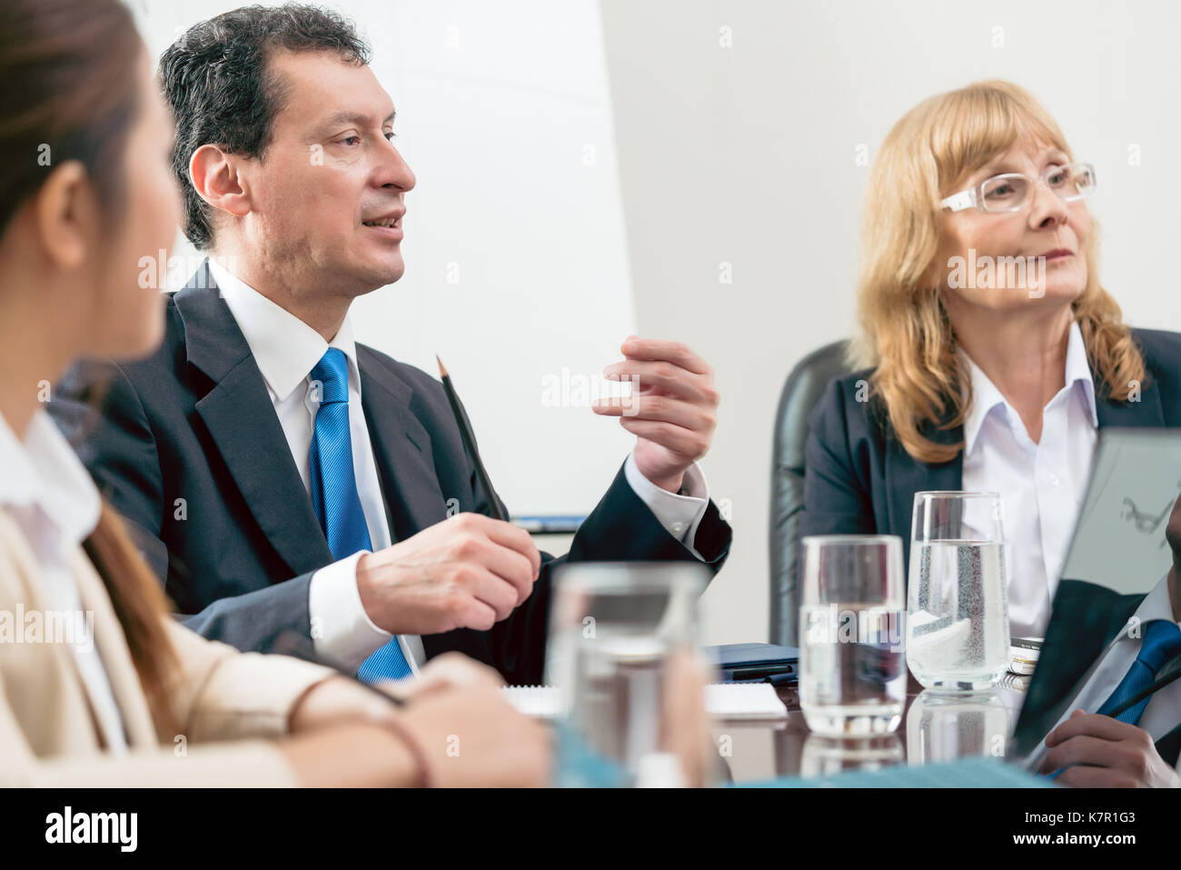 Expert businessman sharing his view during a decision-making mee Stock Photo