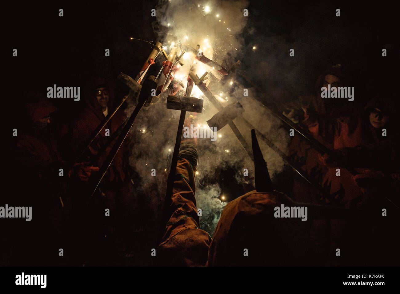 Sitges, Spain. 16 September, 2017:  Fire-runners gather to enlighten their fireworks in the 'night of fire' (nit de foc) during Sitges' little 'Festa Major', 'Santa Tecla' Stock Photo