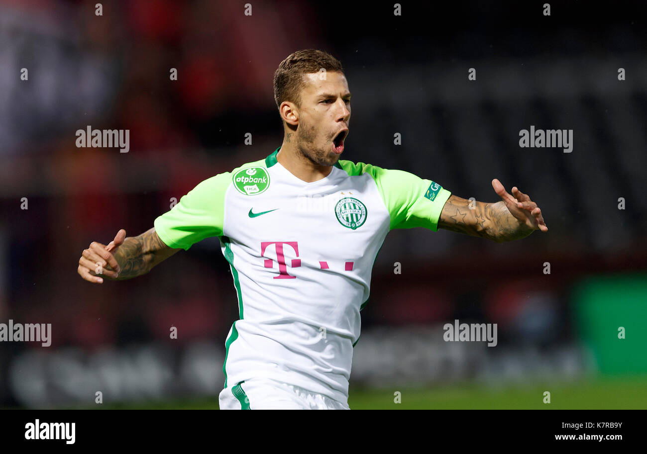 BUDAPEST, HUNGARY - JULY 12: (r-l) Roland Varga of Ferencvarosi TC hugs  goal scorer Stefan