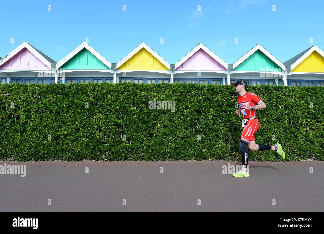 Ironman 70.3 competitor during the running stage. Credit: Finnbarr Webster/Alamy Live News Stock Photo