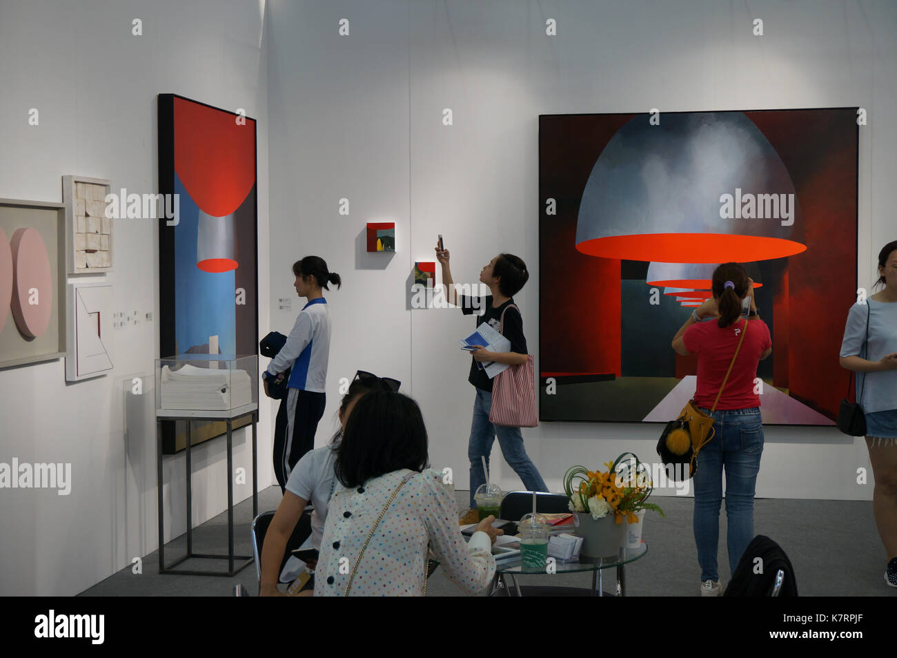 Visitors taking photos of artwork at 2017 Art Shenzhen art exhibition. Stock Photo