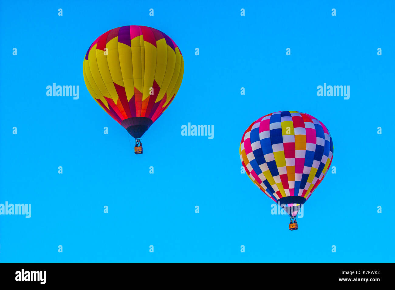 Multi Colored Hot Air Balloons Against Blue Sky Background Stock Photo ...